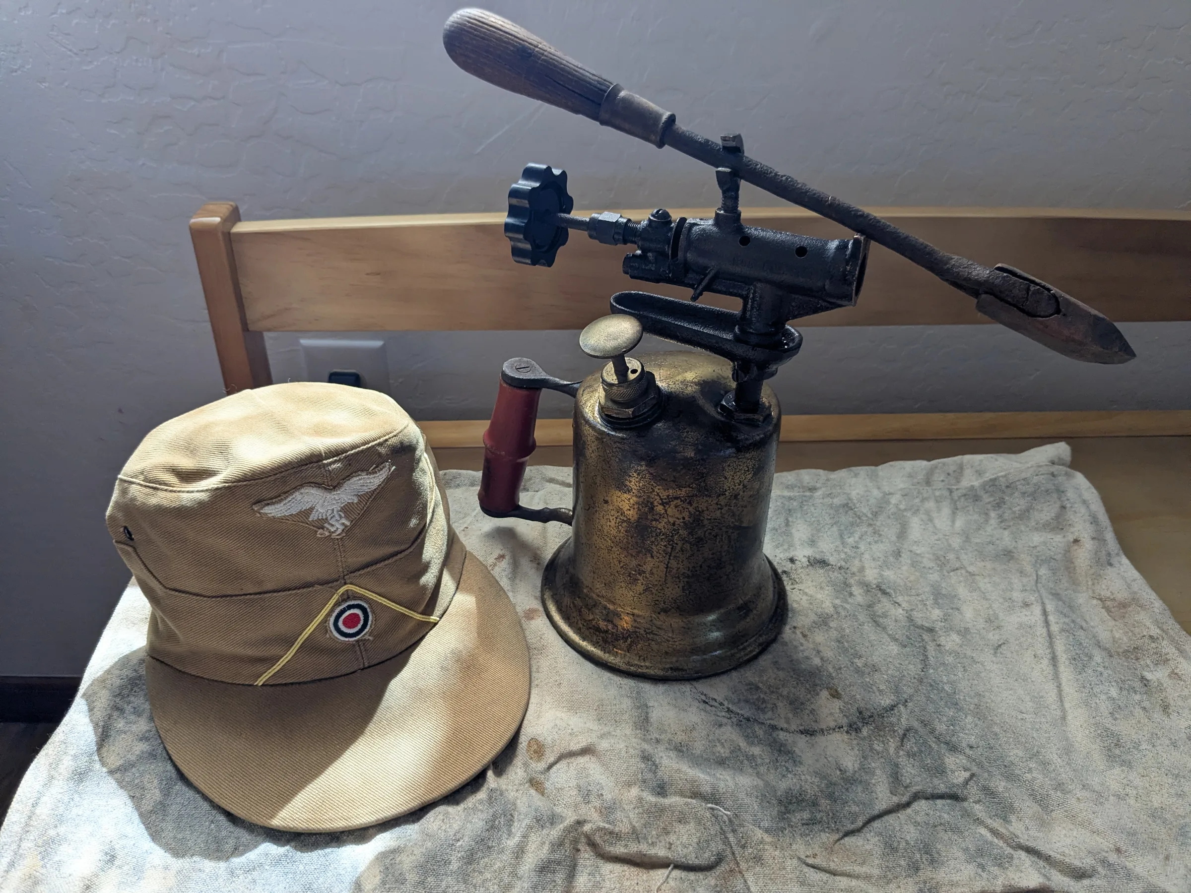 Africa campaign cap and gas blowtorch, photograph 1 of 4